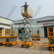 hydraulic small china aerial lift jacks / used cargo elevator/scissor lift trolley platform stationary scissors lift